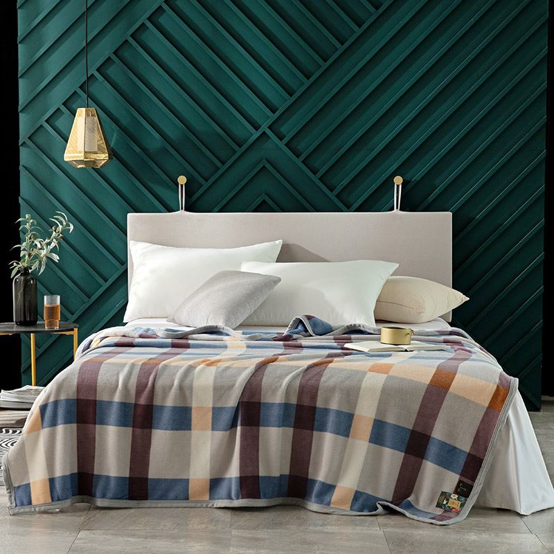 啄木鸟经典休闲多用暖阳绒毛毯-松耶