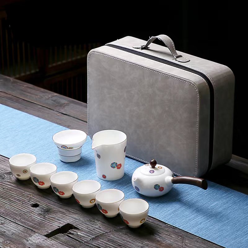 鹏翼雪绒花羊脂玉瓷浮雕茶具套装